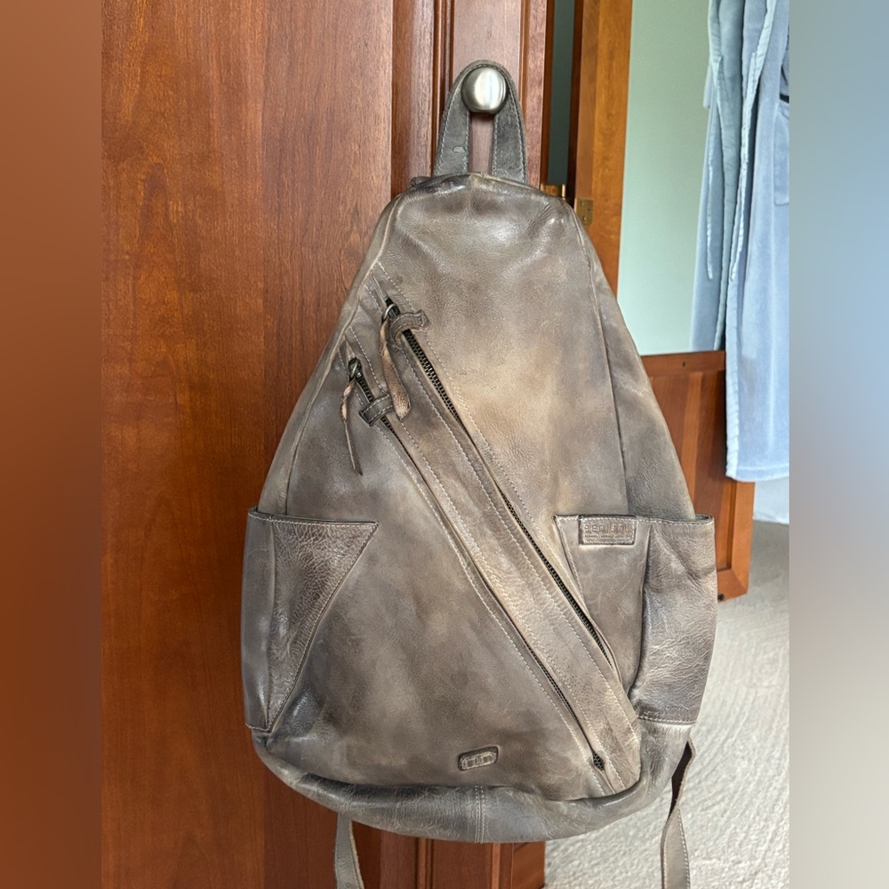Preowned dark grey bed stu backpack.
